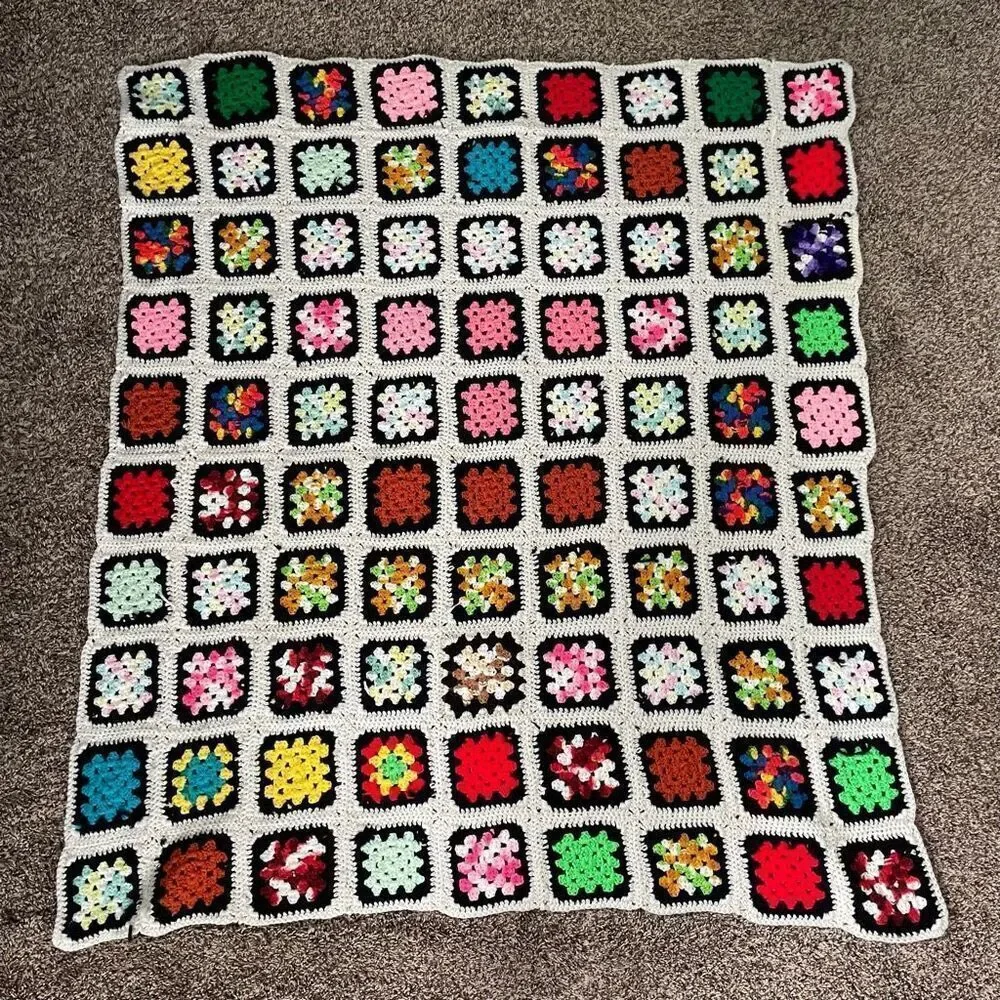 Colorful black/cream granny square blanket